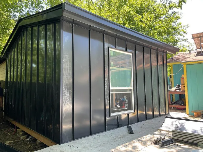 Black standing seam metal wall panels for Roof Inspection in Lyon